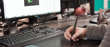 Artist drawing digitally on a wacom